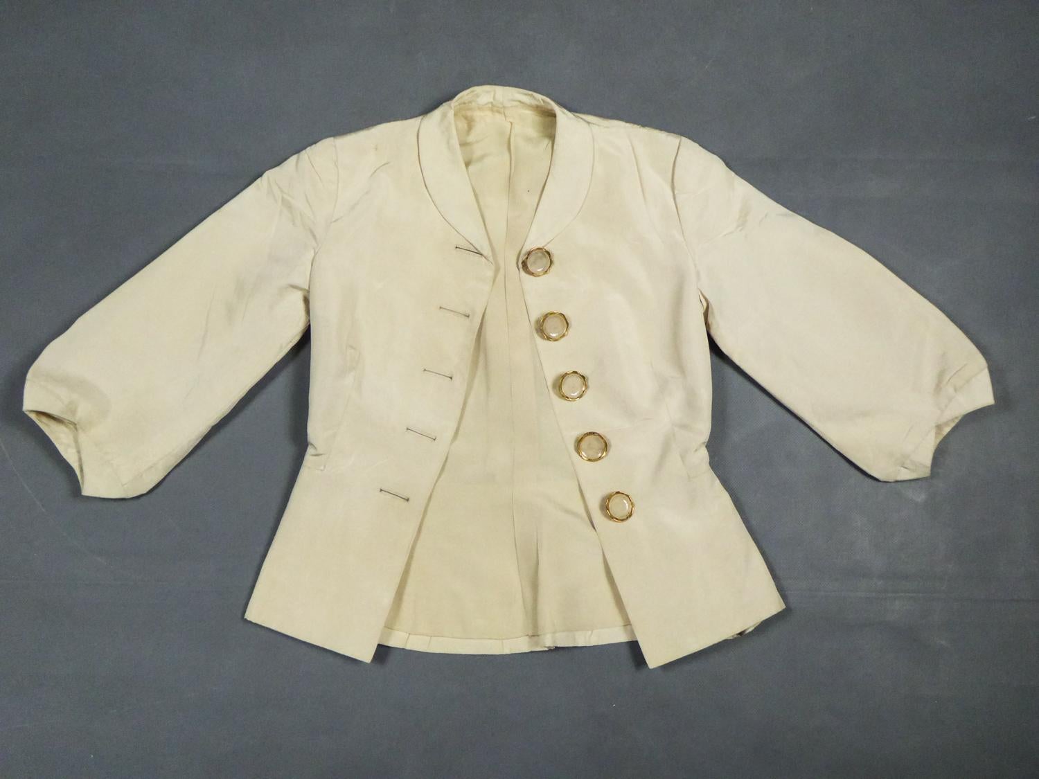 An Elsa Schiaparelli Bar Jacket in Cream Silk Numbered 89254 Circa 1947-1950 7