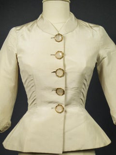 An Elsa Schiaparelli Bar Jacket in Cream Silk Numbered 89254 Circa 1947-1950