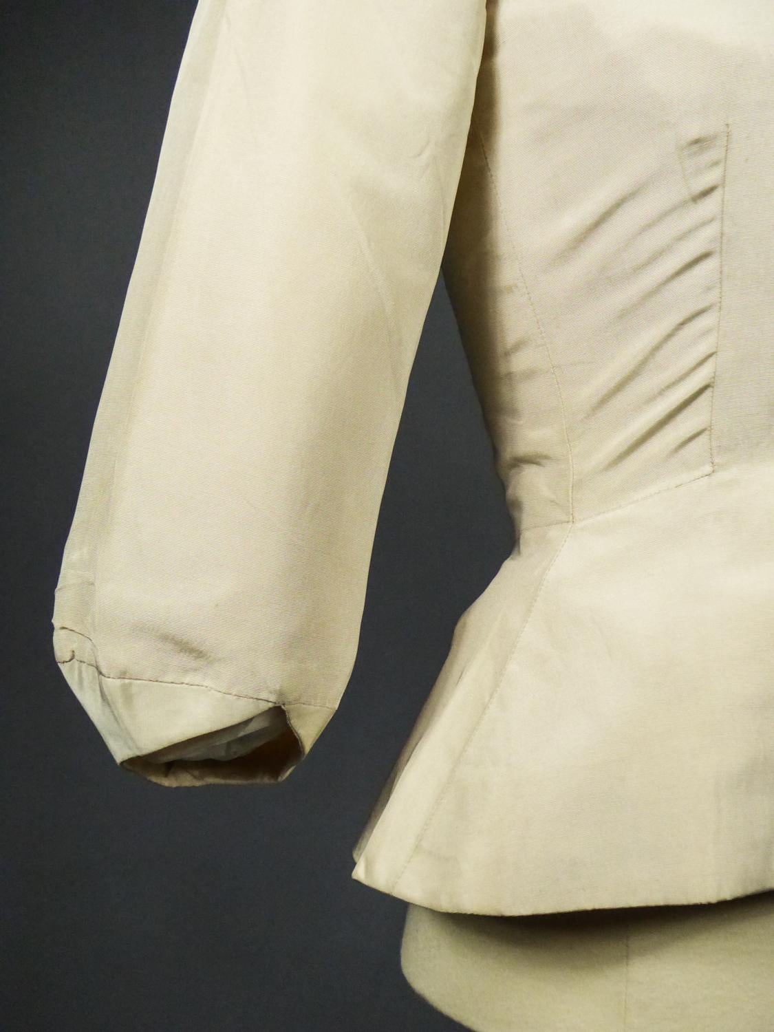 An Elsa Schiaparelli Bar Jacket in Cream Silk Numbered 89254 Circa 1947-1950 1