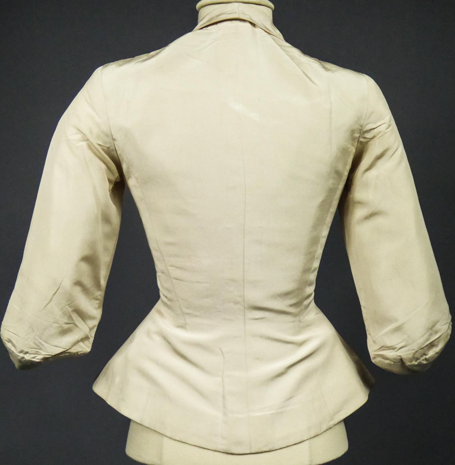 An Elsa Schiaparelli Bar Jacket in Cream Silk Numbered 89254 Circa 1947-1950 3