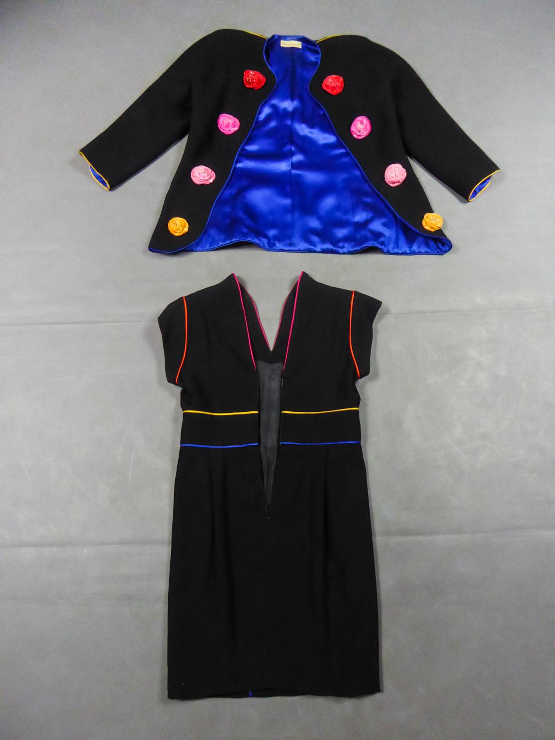Autumn Winter Collection 1991/1992
France

Dress and jacket set in wool crepe by Emanuel Ungaro Couture Collection 1991/1992. Couture numbered 28819 and 9995. Skin-tight dress with satin piping in the shades or red, blue and yellow pink, shoulder