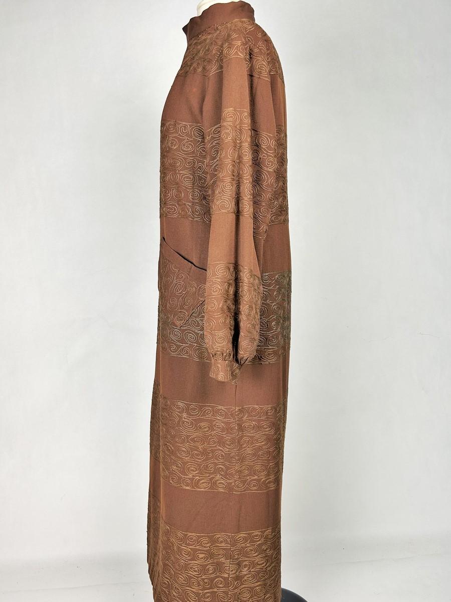 Femenino o masculino Un abrigo de lana bordada, forro estampado de Atelier Martine - Francia C. 1920 en venta