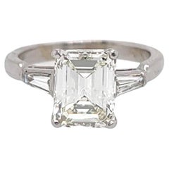 An Emerald Cut Diamond Engagement Ring.