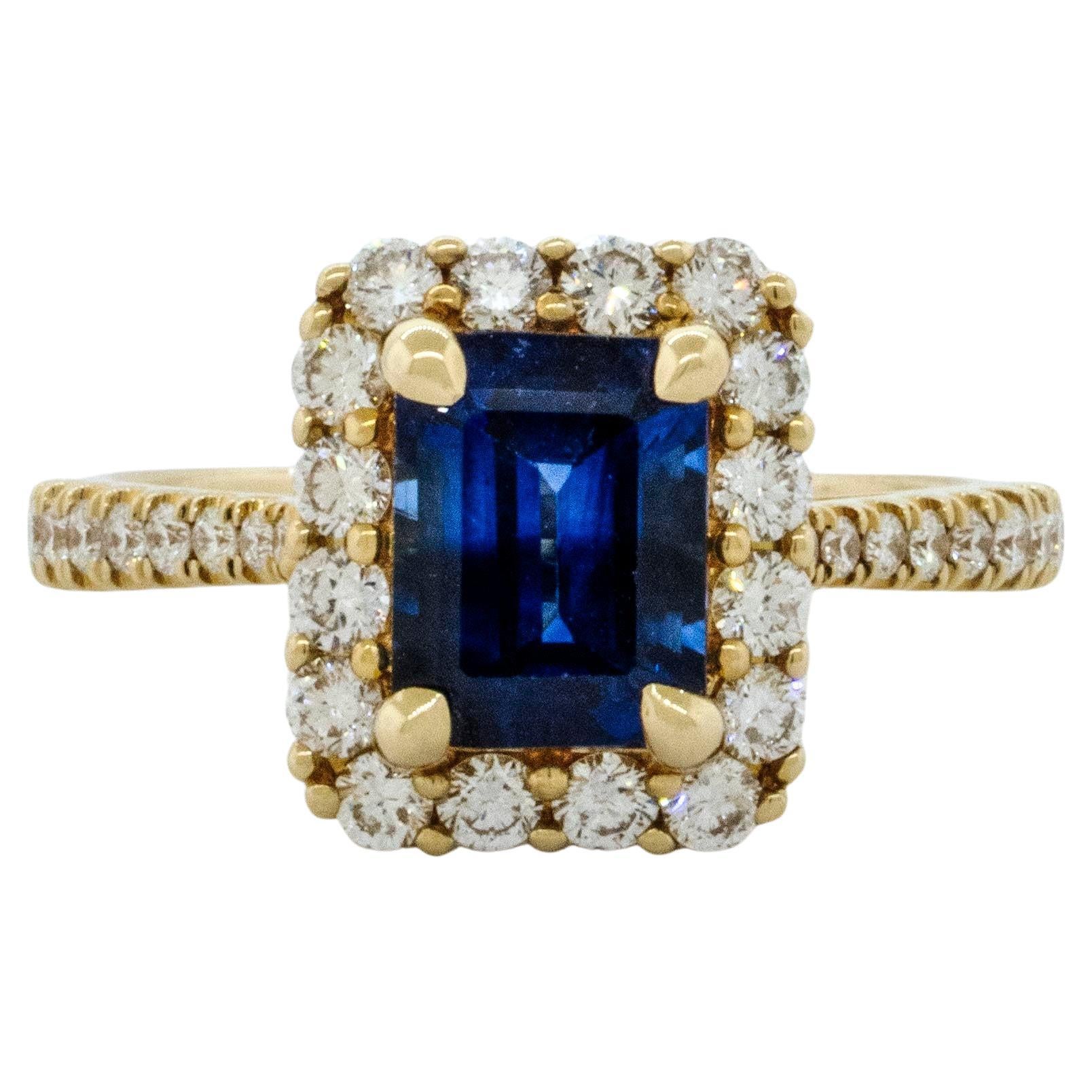 An Emerald Cut Natural Sapphire 1.98 carats w/Diamonds in 14k Yellow Gold Ring