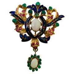 An Emerald, Opal And Ruby Blue Enamel 14k Gold Brooch