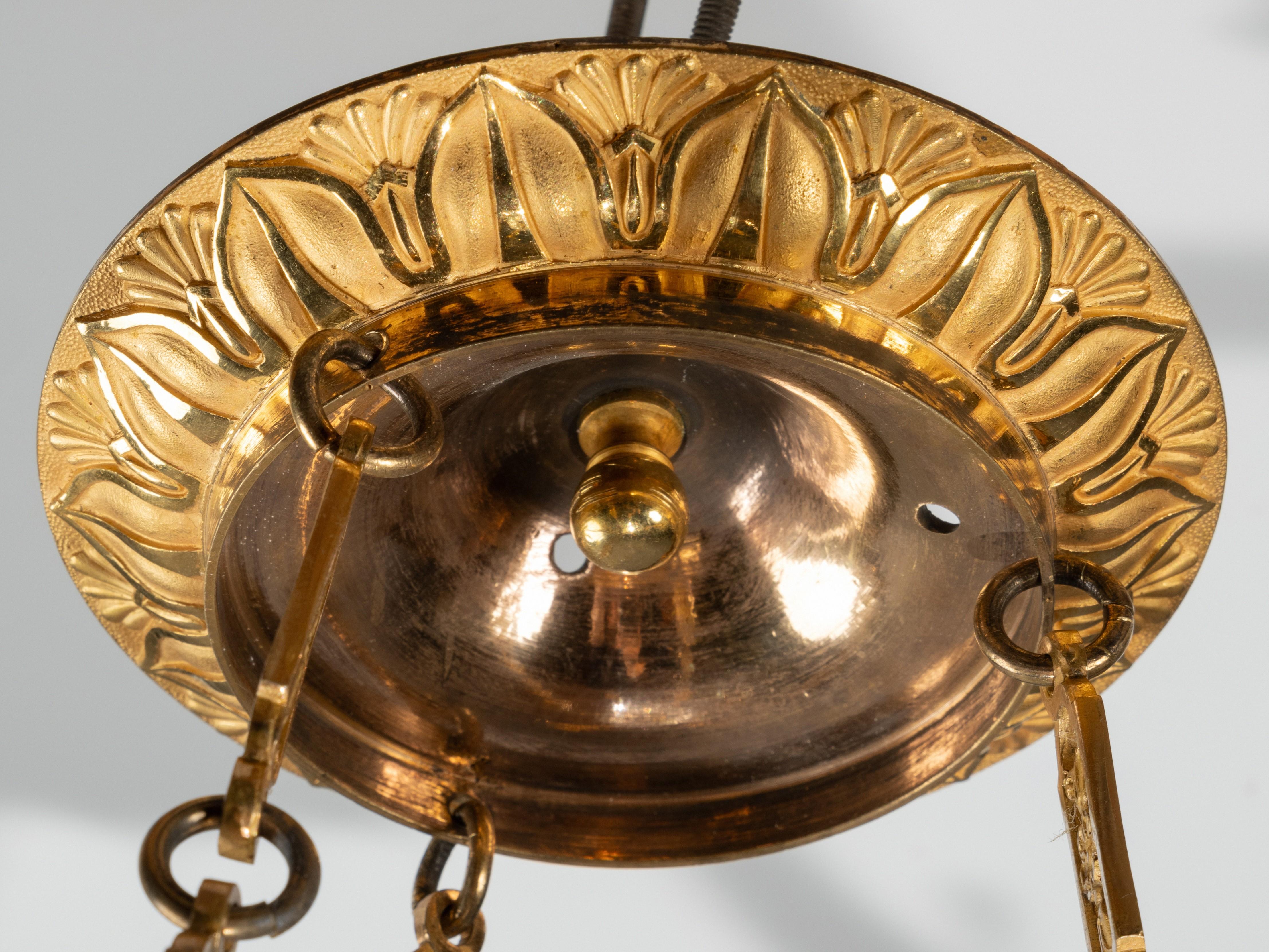 An Empire c. 1810 gilt bronze and crystal chandelier attributed to Ravrio, Paris 6