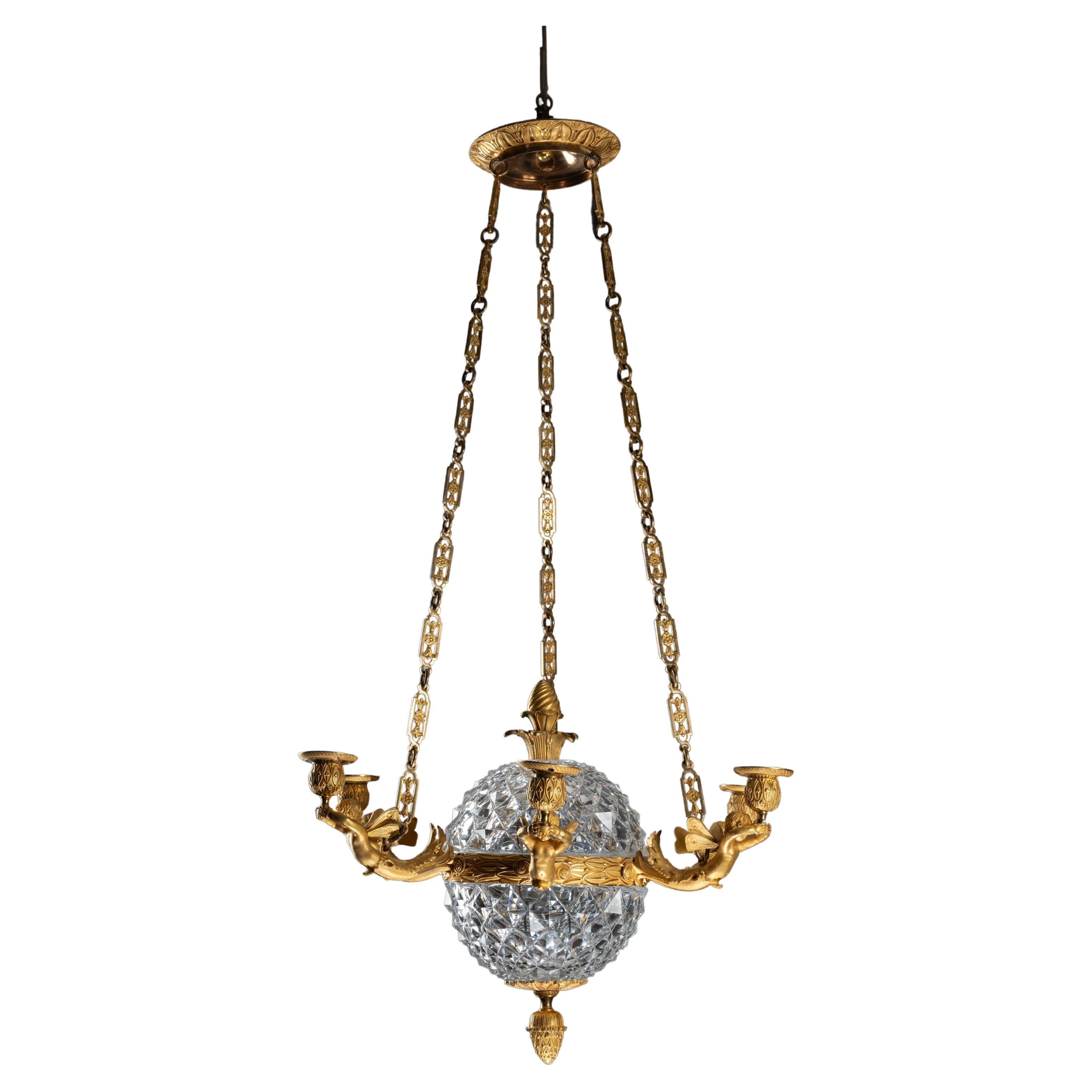 An Empire c. 1810 gilt bronze and crystal chandelier attributed to Ravrio, Paris