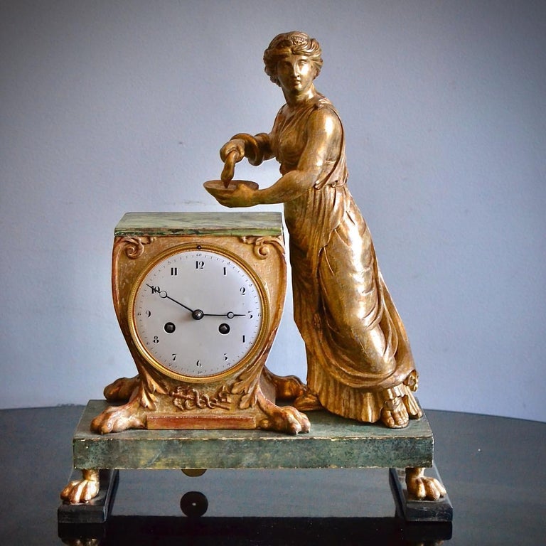 Hand-Carved A Russian Empire Carved Gilt Wood and Faux Malachite Painted Mantel Clock For Sale