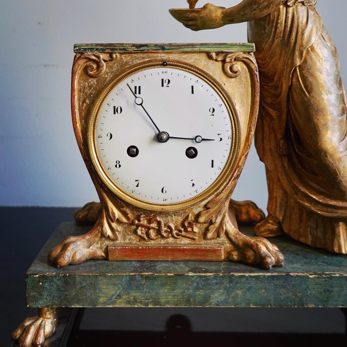 Hand-Carved A Russian Empire Carved Gilt Wood and Faux Malachite Painted Mantel Clock For Sale