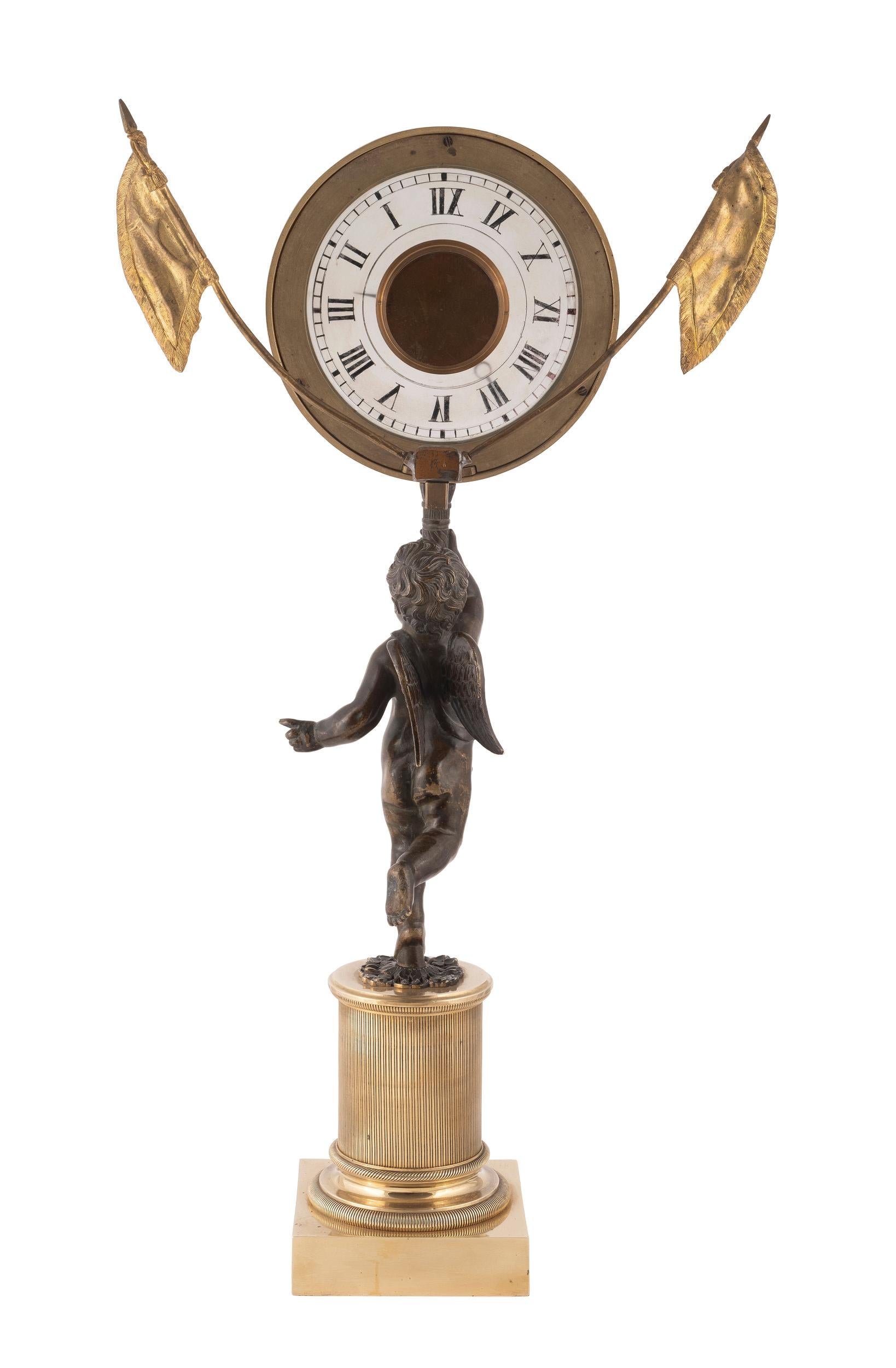 Very nice high quality French Empire clock, showing a Cupid holding two flag. The opaline dial with Roman and Arabic numbers. The watch is signed by Eugene Bornand
Height 19in (48cm)