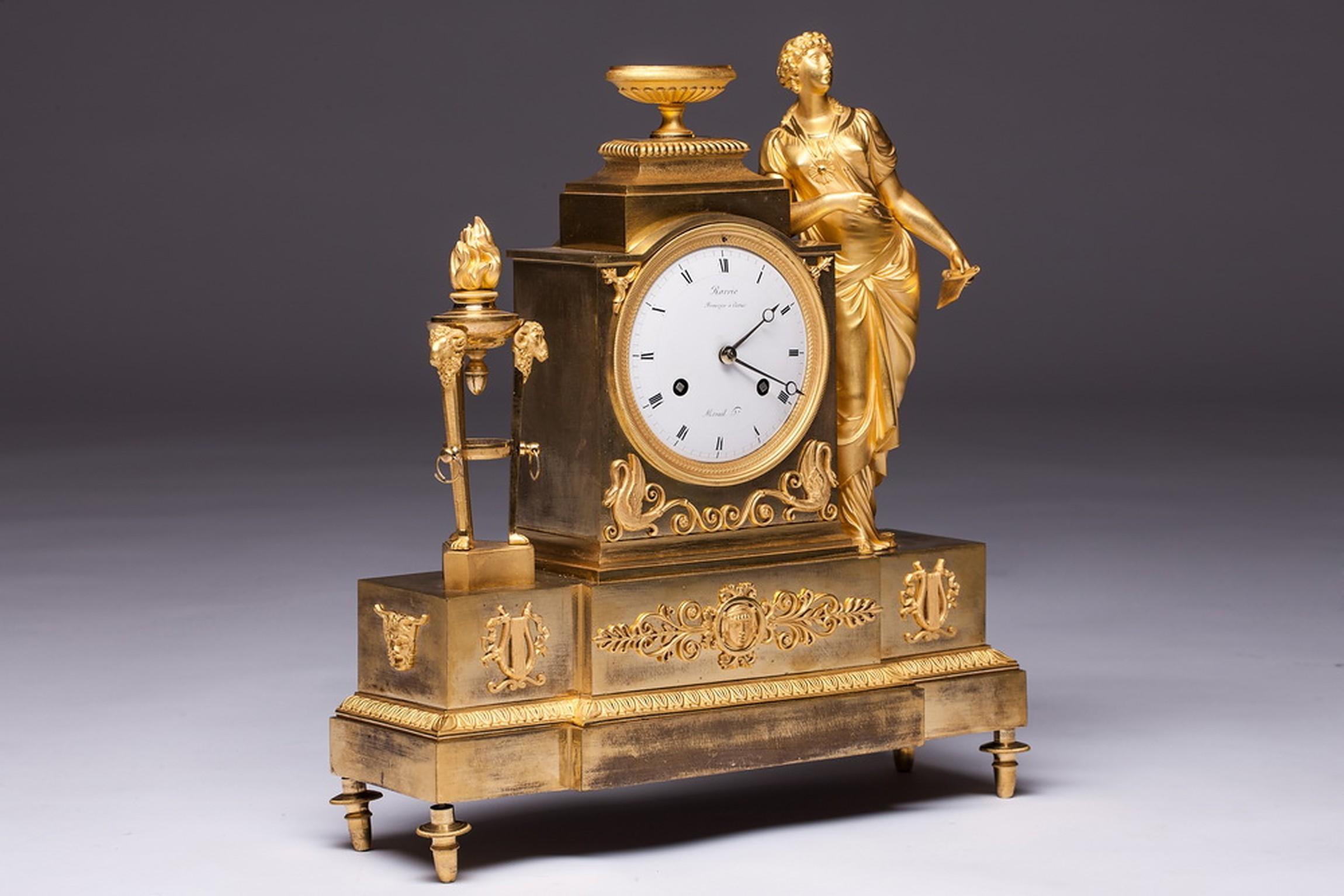 An empire ormolu mantel clock by André-Antoine Ravrio André-Antoine Ravrio, (1759-1814) was a French sculptor in bronze and was made a master founder in 1777 setting up in business 1790. Although Ravrio enjoyed success during Louis XVI’s reign, he