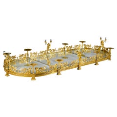 Un Surtout de Table a tre pezzi in bronzo dorato del periodo Impero, attribuito a Denière