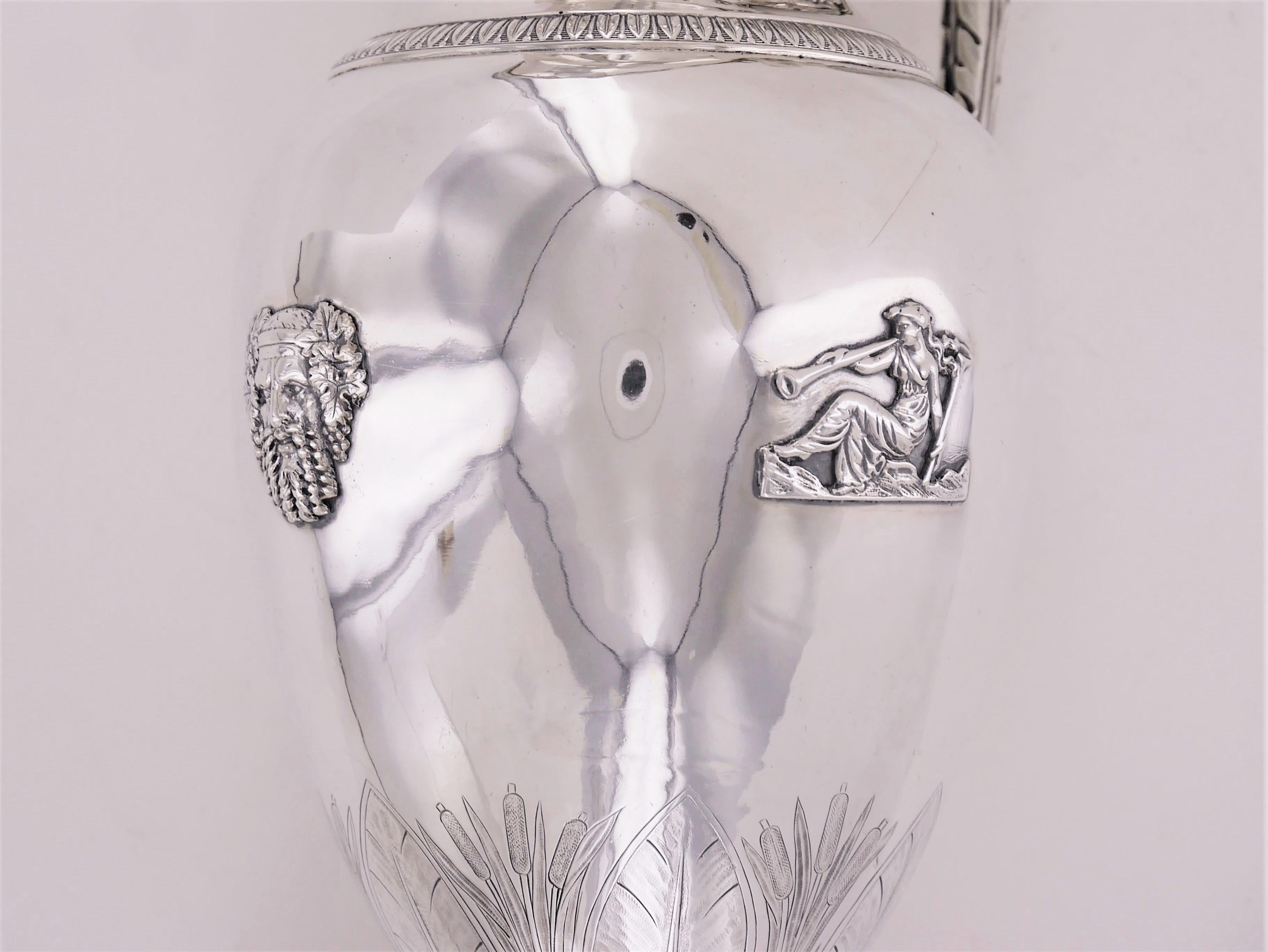 An important Empire ewer in sterling silver. This exceptional piece is going to make each table to a feast. Its remarkable style shows the perfect taste of its owner.

Punches that you can find on this piece:

Paris (1809-1819).
Association of
