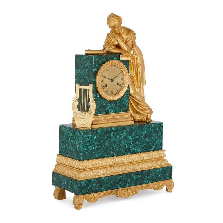 An Empire style ormolu and malachite mantel clock by Denière
French, c.1820
Measures: Height 50cm, width 33cm, depth 14cm

Made in the early nineteenth century, not long after the First French Empire period, this excellent piece is a malachite