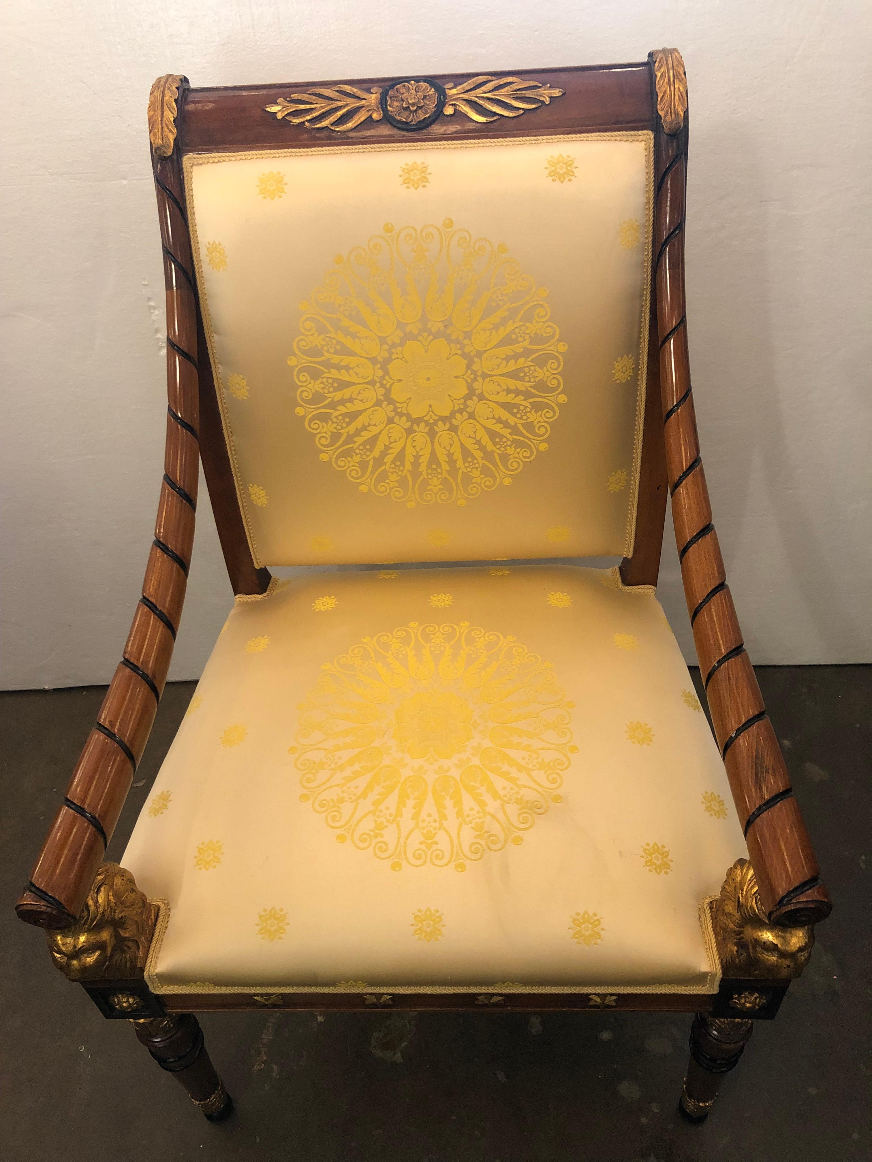 French Empire Style Parcel Gilt and Ebonized Armchair For Sale