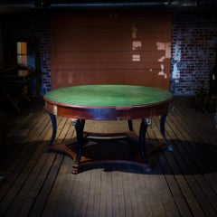 An Empire style round center library table, late 19th Century