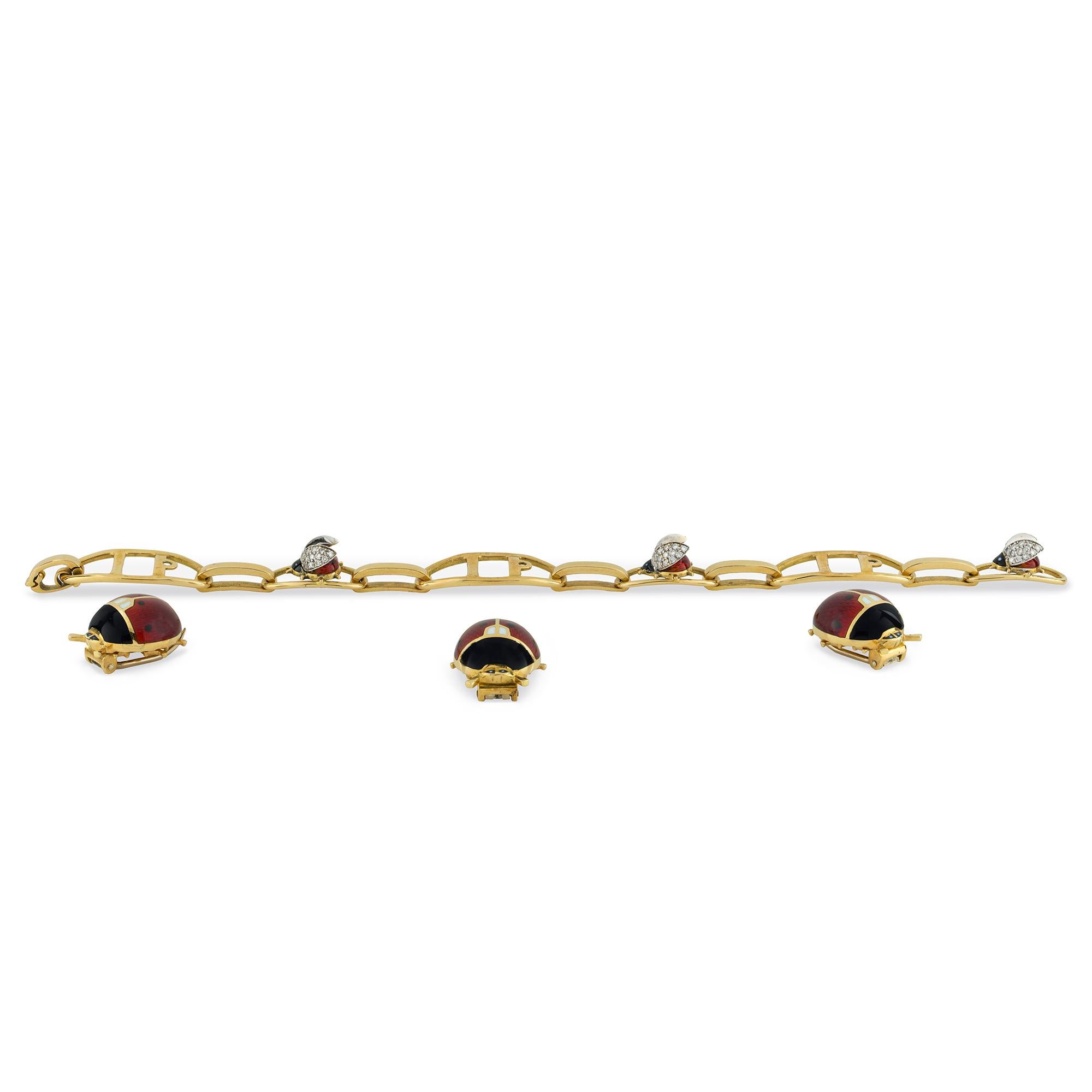 An enamel and diamond ladybird bracelet, set with three detachable guilloché enamel ladybird clips, alternating with smaller enamel ladybirds with pavé-set brilliant-cut diamond wings, diamonds estimated to weigh approximately a total of 0.35ct