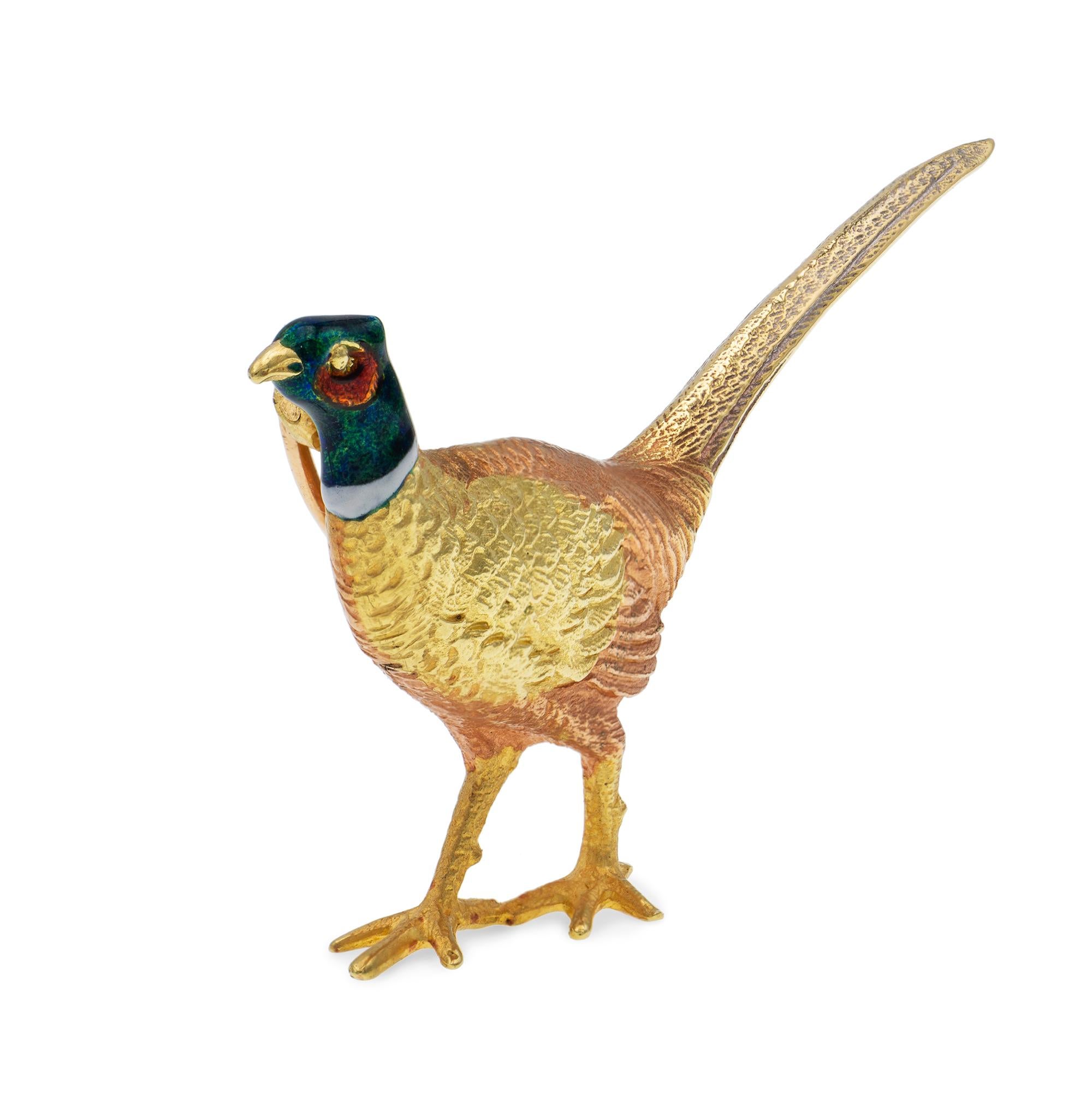An enamel and gold pheasant brooch, depicting the adult male ring-necked pheasant, the body is realistically carved and made in rose and yellow gold with an enamelled head, hallmarked for 18ct gold, London 2017, bearing the Bentley & Skinner sponsor