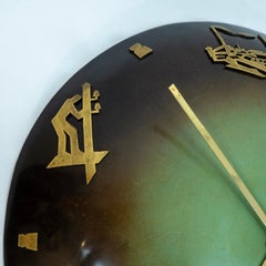 Eine Wanduhr aus emailliertem Kupfer von Ystad-Metall