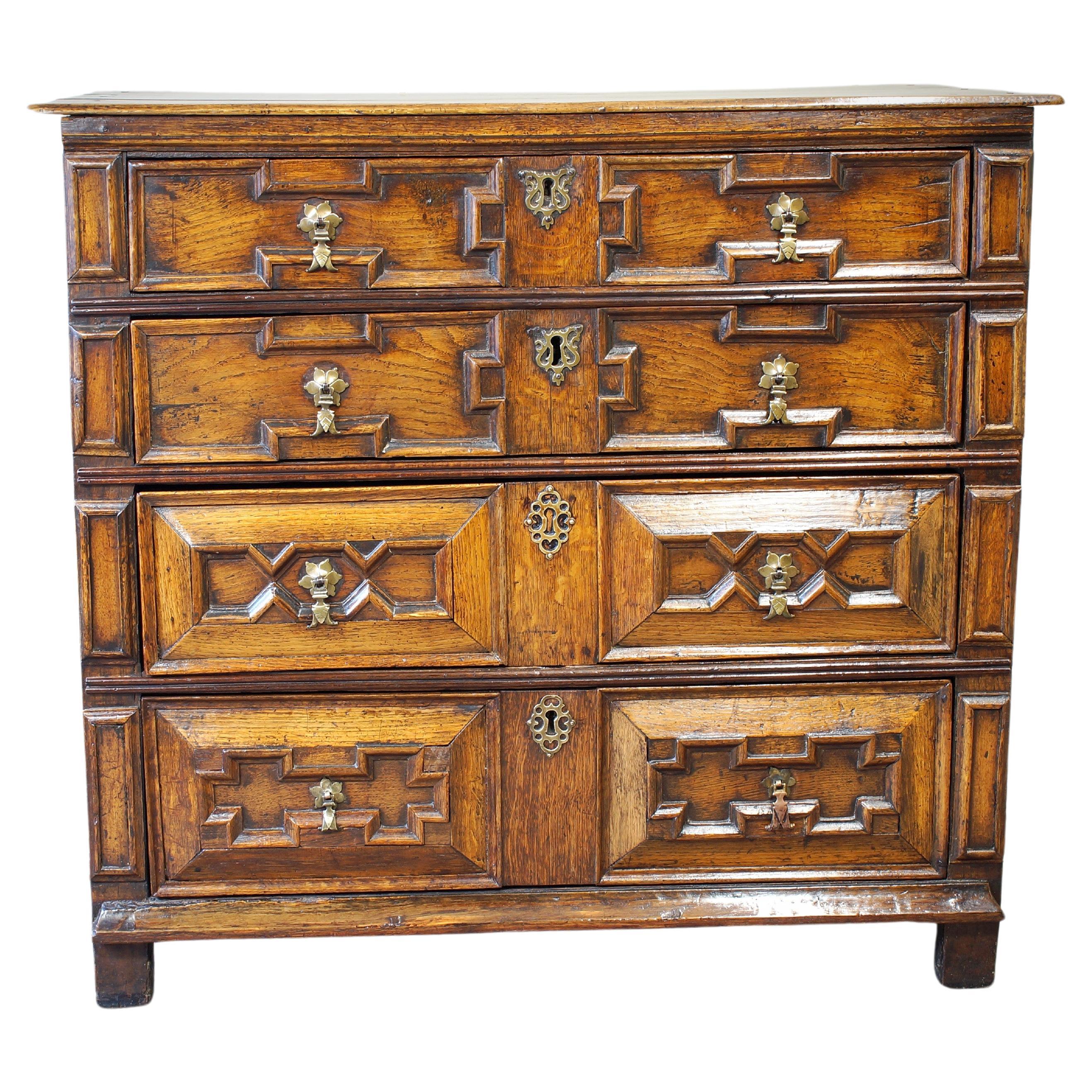 An English 17th Century Cushion Moulded Chest Of Drawers For Sale