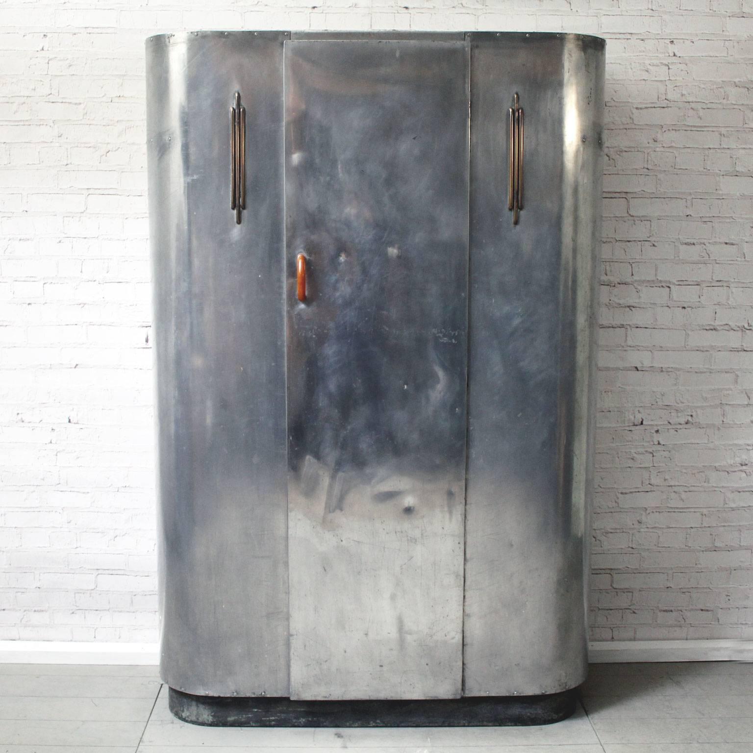 This sleek wardrobe was made by British company Huntington Aviation just after World War II from high grade aircraft aluminium surplus used for WWII planes. We believe this piece, based on the airstream mobile home design, to be by Ernest Race.
We