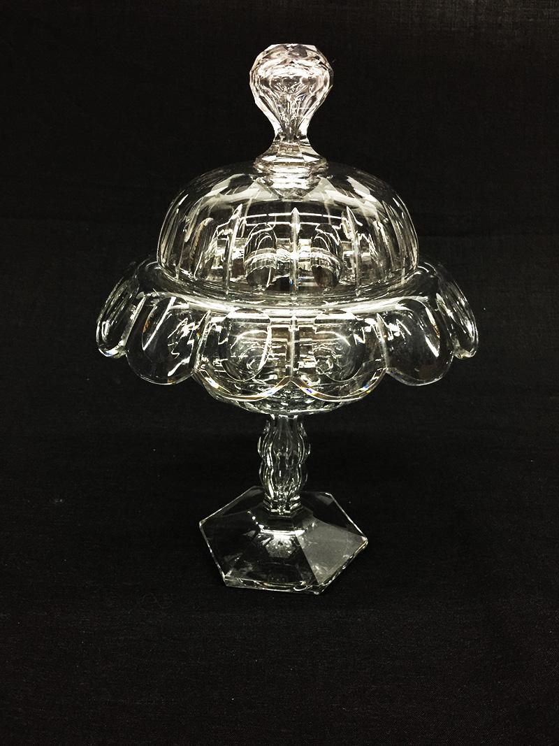 An English 19th century crystal lidded coupe

An English crystal cut coupe with lid
The coupe raised on a hollow hand blown stem 
The measurement of the coupe is 30 cm high and 22 cm diagonal.