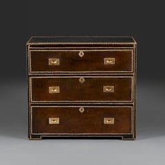 An English 19th Century Leather Bound Campaign Chest of Drawers