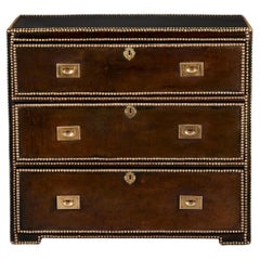 An English 19th Century Leather Bound Campaign Chest of Drawers An English 19th Century Leather Bound Campaign Chest of Drawers