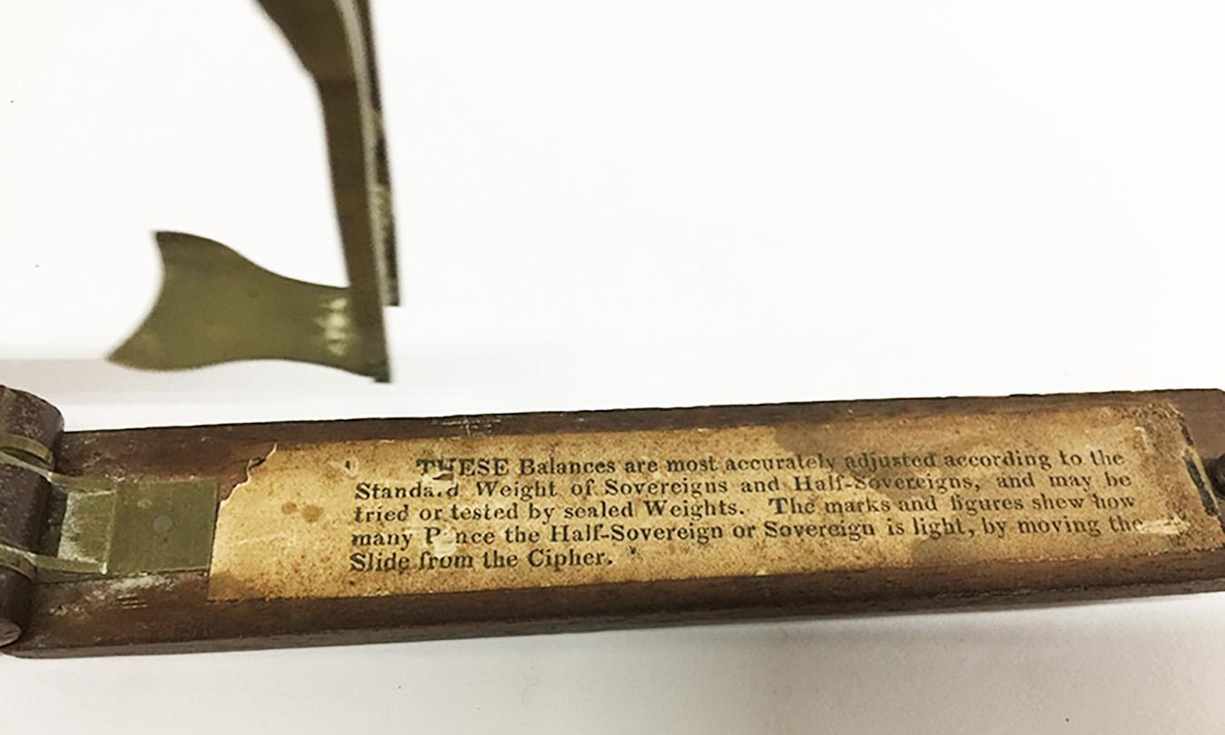 An English 19th century small folding coin scale, self raising in mahogany box

Made and sold by James Glover watch movement maker Cronton near Prescom Lancashire, England

circa 1848

The scale raises and stands automatically when the clasp