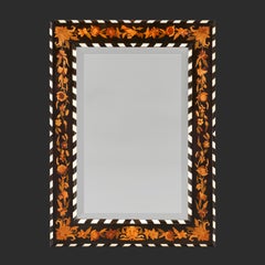 An English 19th Century Striped Black and White Marquetry Mirror