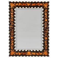 An English 19th Century Striped Black and White Marquetry Mirror