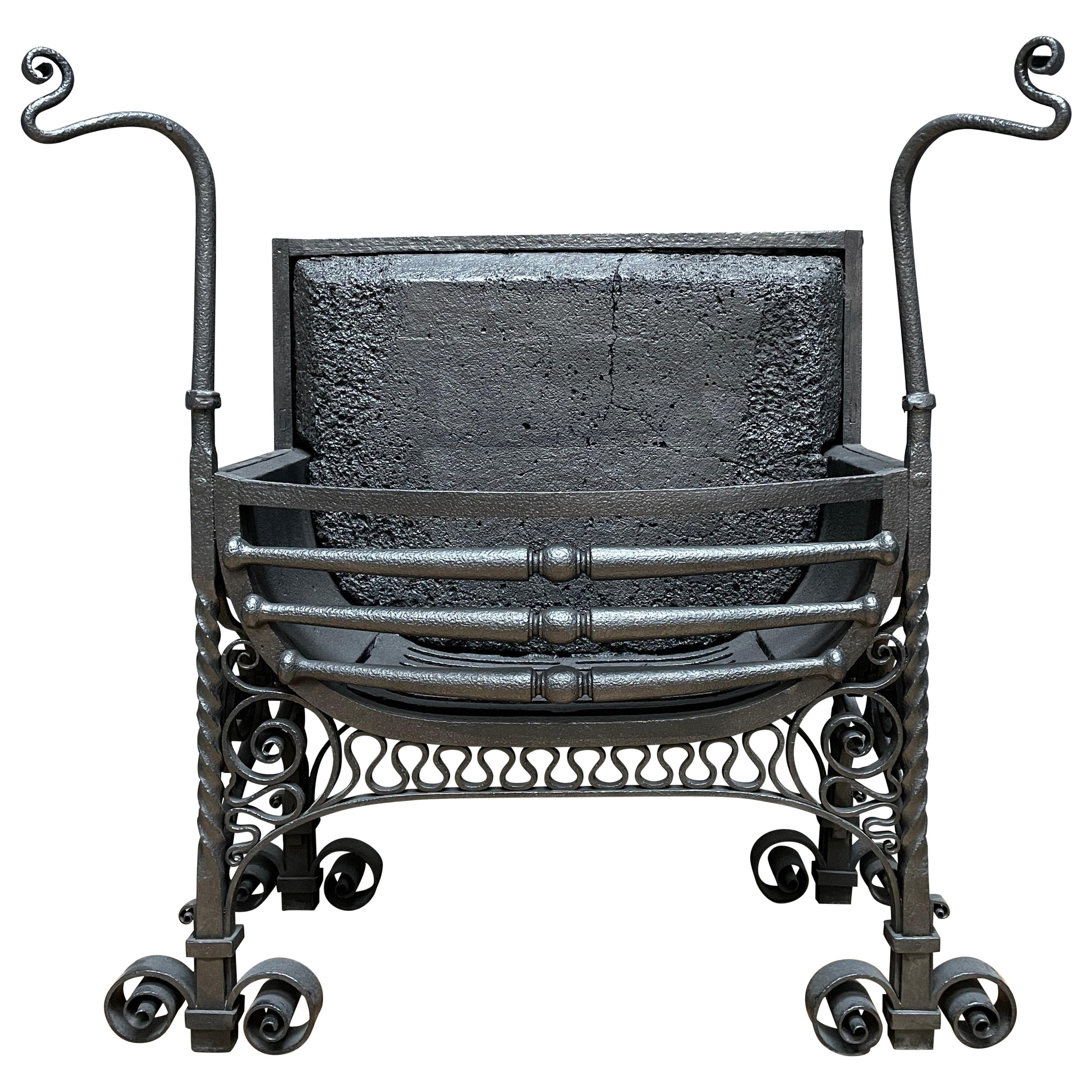 An English Antique Arts & Crafts Wrought Iron Fire Grate For Sale