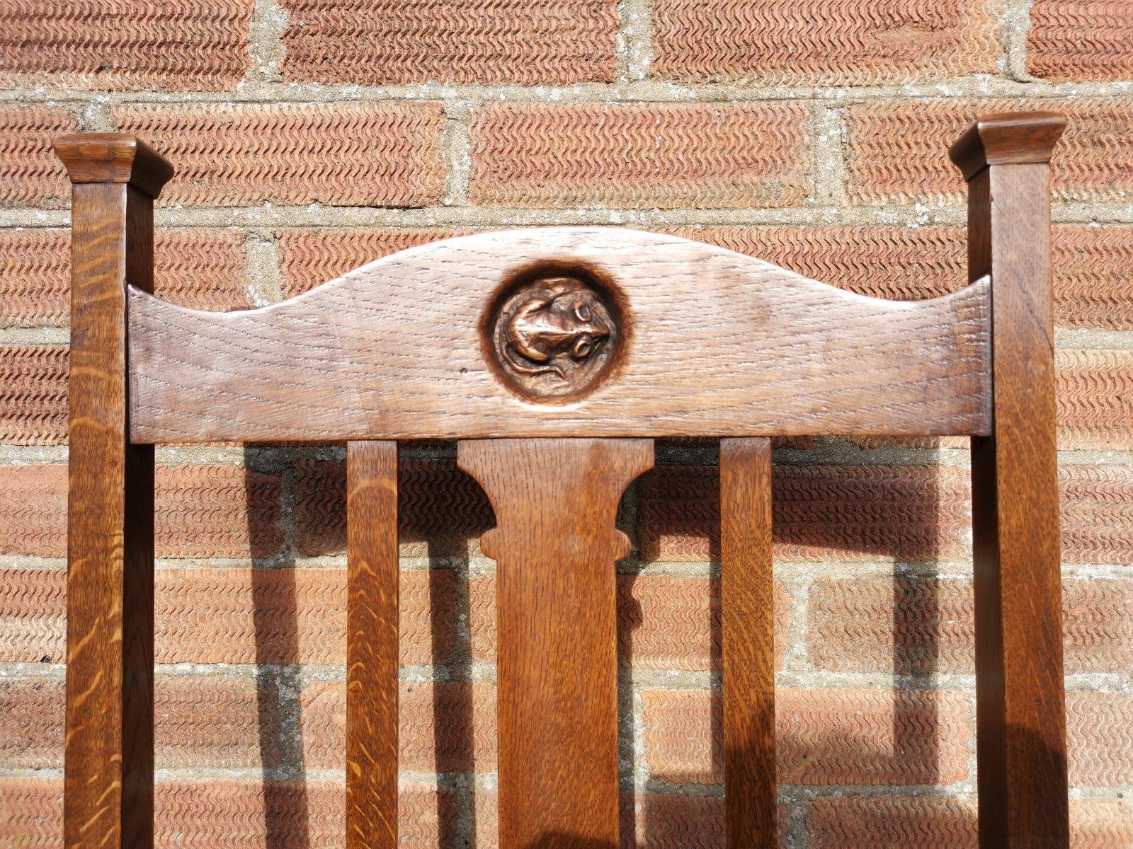 Arts and Crafts English Arts & Crafts Oak Armchair with a Carved Mouse Inset to the Headrest For Sale