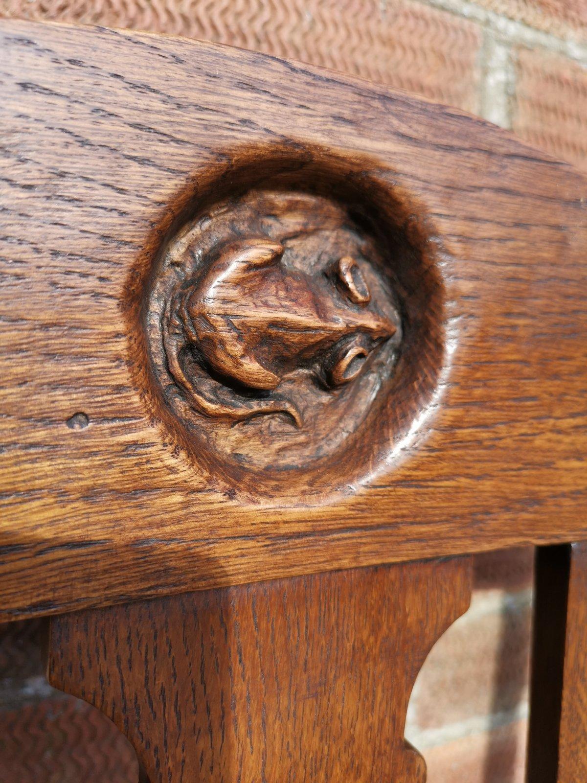 Early 20th Century English Arts & Crafts Oak Armchair with a Carved Mouse Inset to the Headrest For Sale