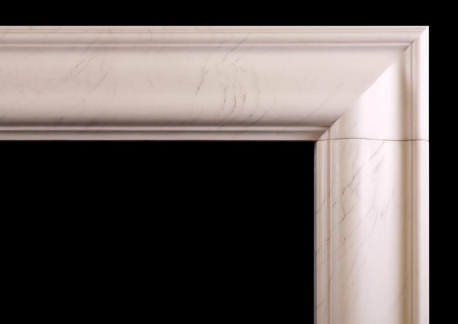 A stylish English moulded bolection fireplace in Venato Light stone, a hard limestone with a neutral hue. A good quality copy of the Queen Anne design. Modern.

Shelf Width:	        1370 mm      	53 ⅞