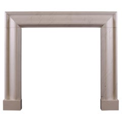 An English Bolection Fireplace in Venato Light Stone