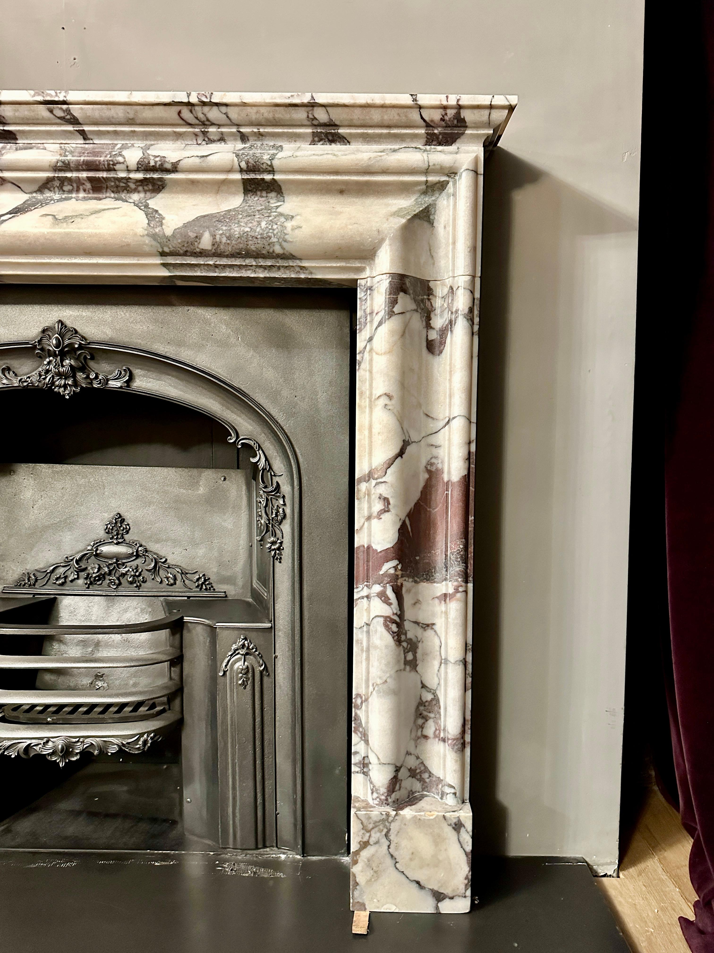 Carved An English Bolection Fireplace Mantel In Breche Marble 