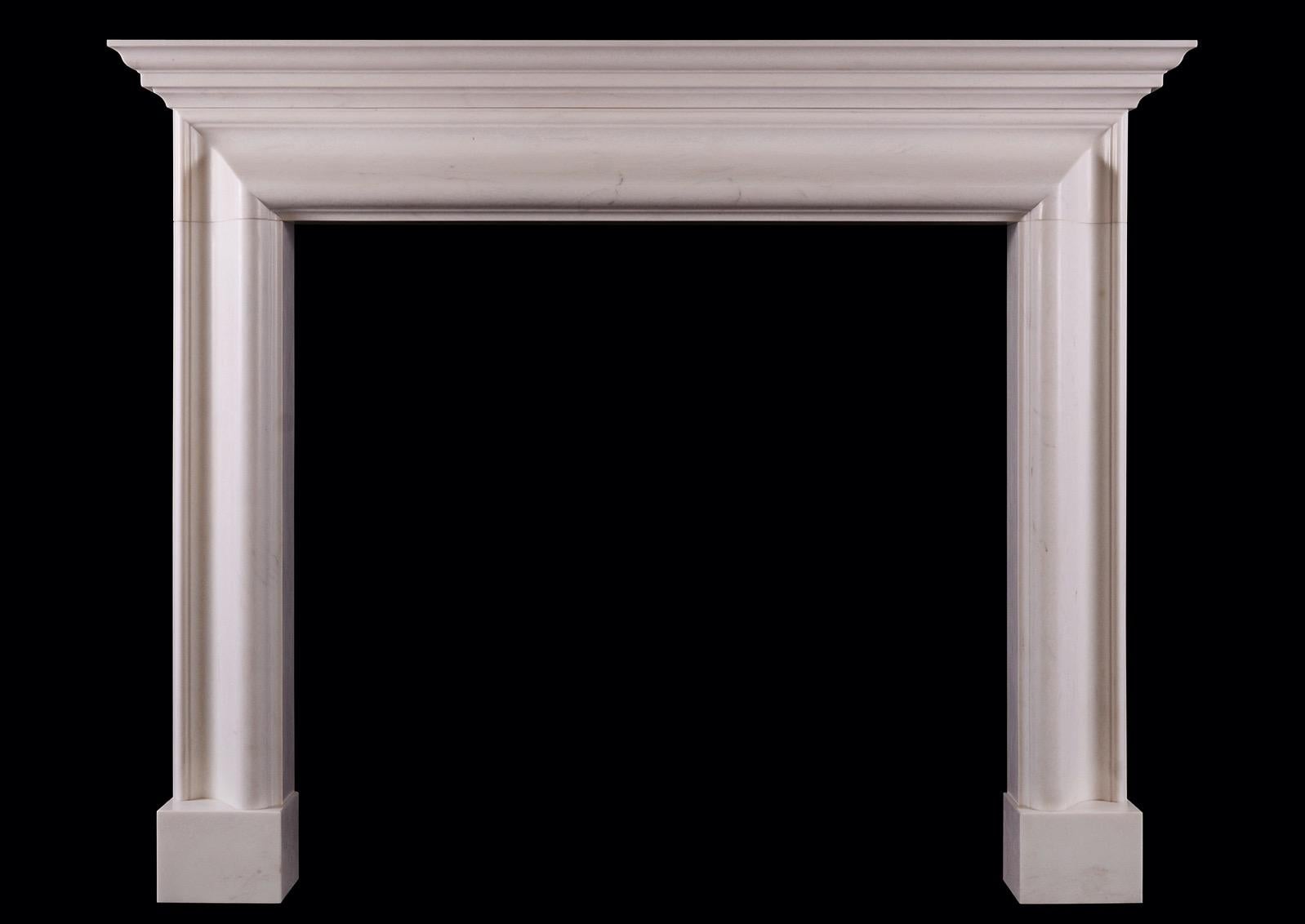 An English bolection fireplace with moulded shelf above. Shown in white marble, could be made in other marbles or limestones if required. English, modern. N.B. May be subject to an extended lead time, please enquire for more information.

Shelf