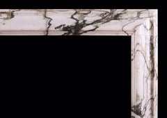 An English Bolection in Calacatta Verde Marble