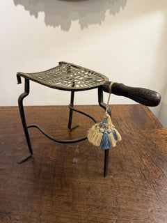 An English Brass and Cast Iron Fireplace Trivet, 18th Century