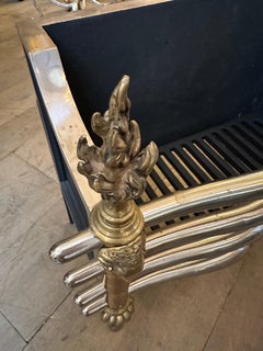 An English Brass And Steel Firegrate In The Regency Manner