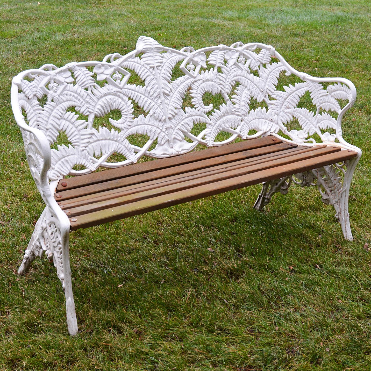 A cast-iron and wood settee in the Fern and Blackberry pattern, marked “CB DALE Co” and with British registration mark by the Coalbrookdale Company, English, circa 1875 (wood slats replaced). 

The design for this garden seat was listed as pattern