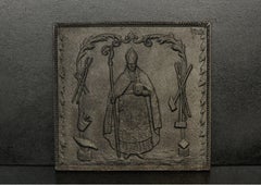 English Cast Iron Fireback Featuring Catholic Figure to Centre