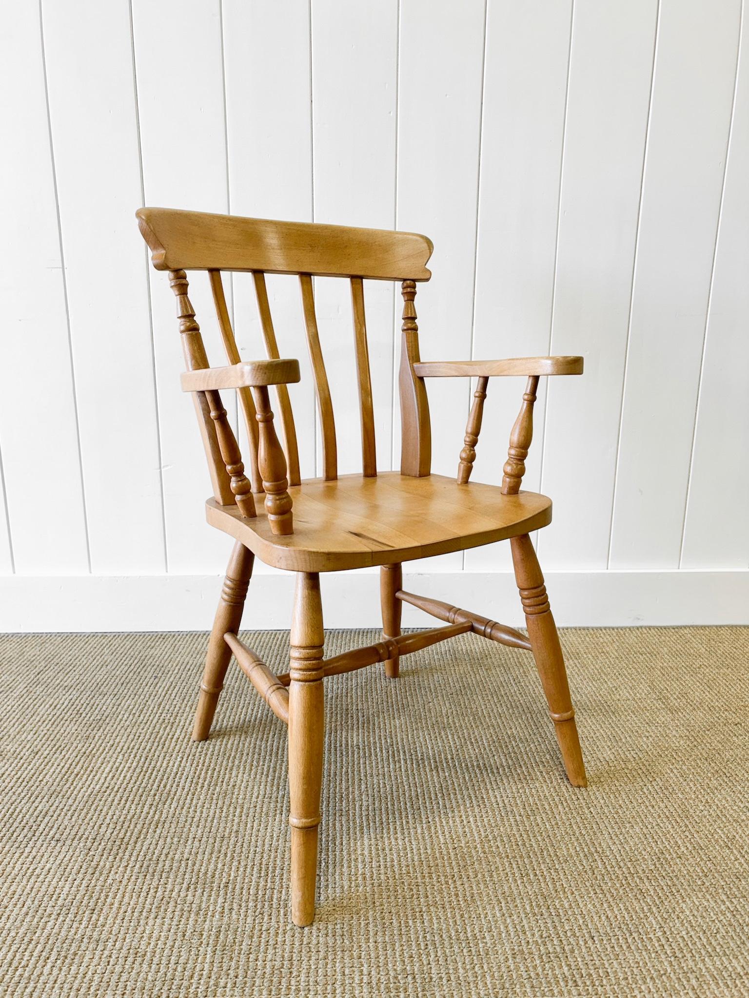 A very useful English arm chair. Light pine finish.  Sturdy enough for a desk chair, but should not be rocked-back on!

Condition: scratches, dents, marks, some spots of the finish are worn, stains -  historical repairs - beautiful