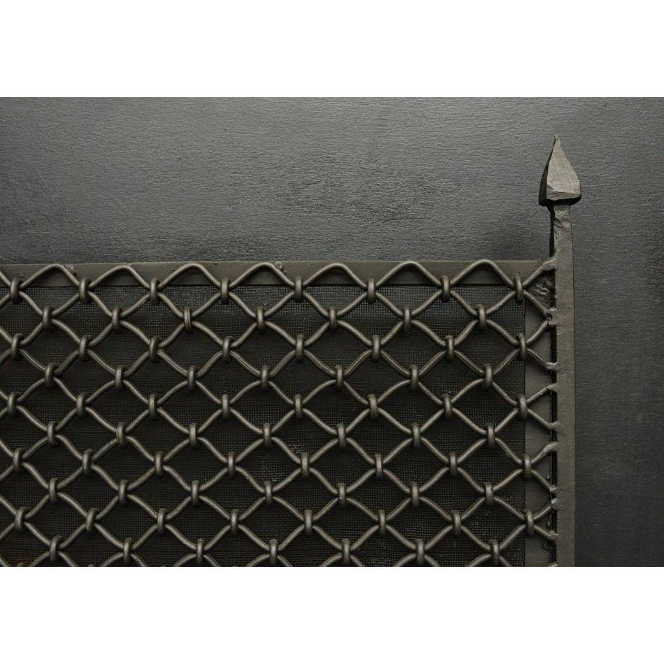 An unusual wrought iron fireguard in the Gothic style. The arched feet surmounted by heavy chainmail mesh and finials above. English, 19th century. Could be polished if required.

Additional information:
Height: 698 mm / 27 ½