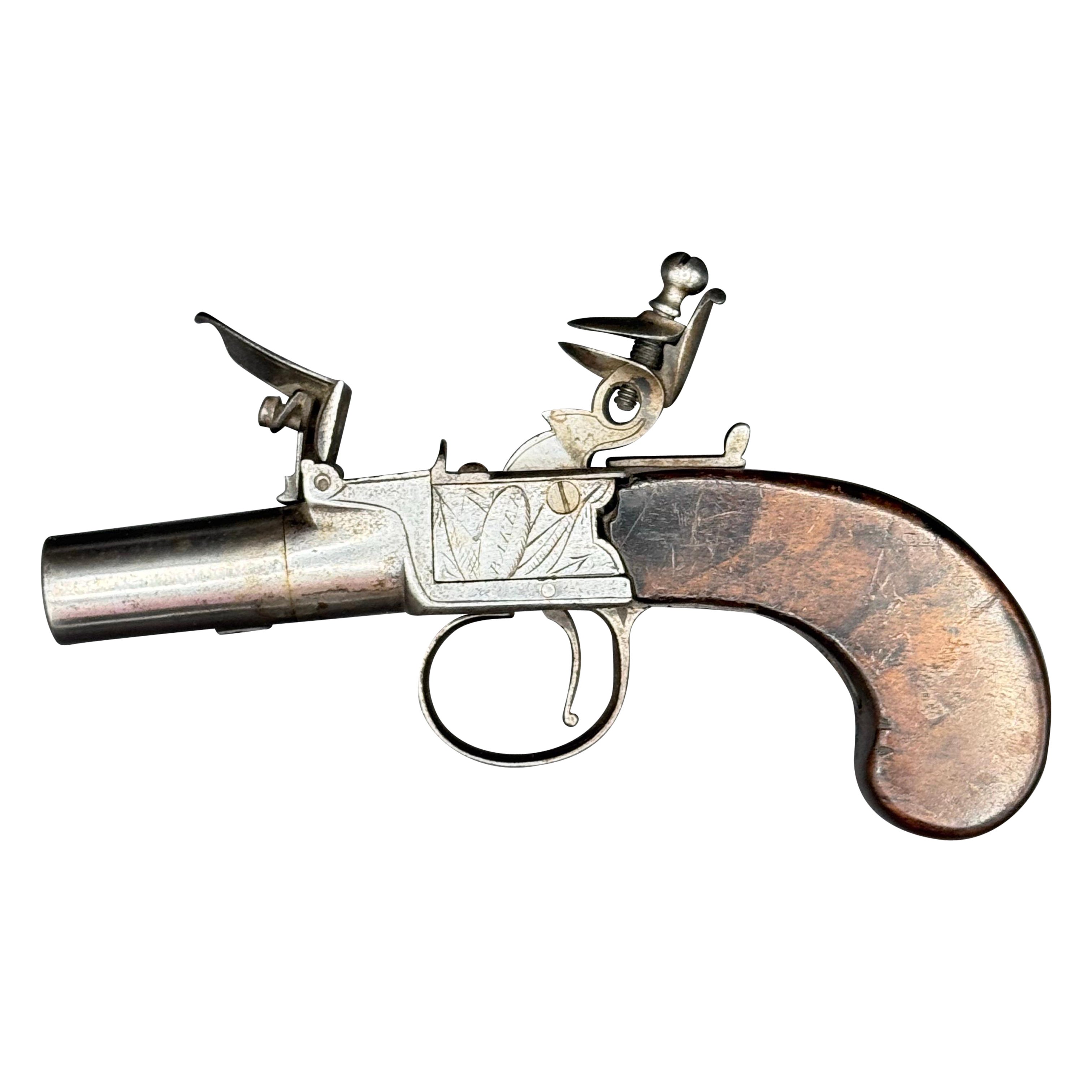 Eine englische Steinschloss-Schraubschloss-Pistole