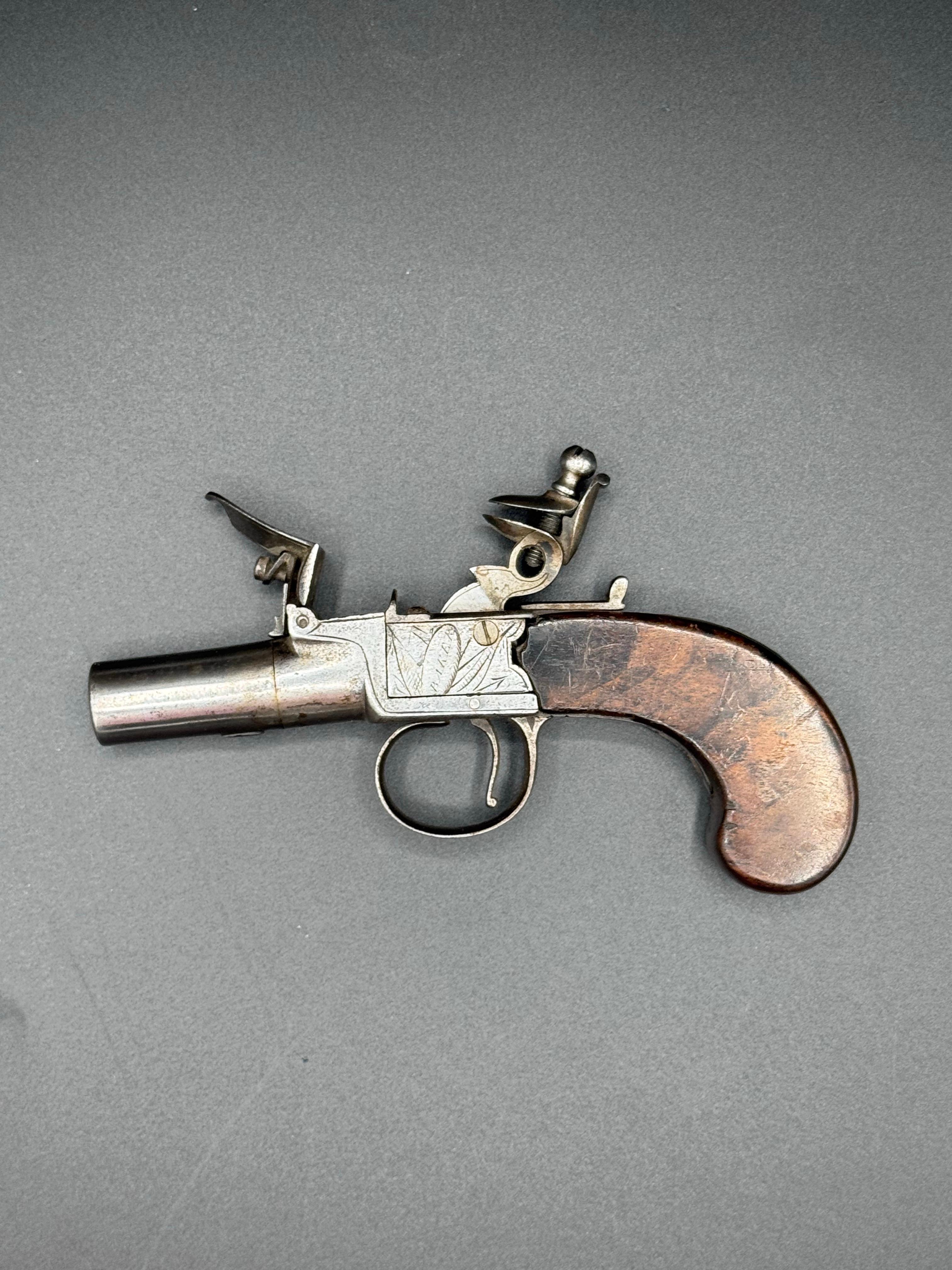 An English Flintlock Screwbarrel Boxlock Pistol