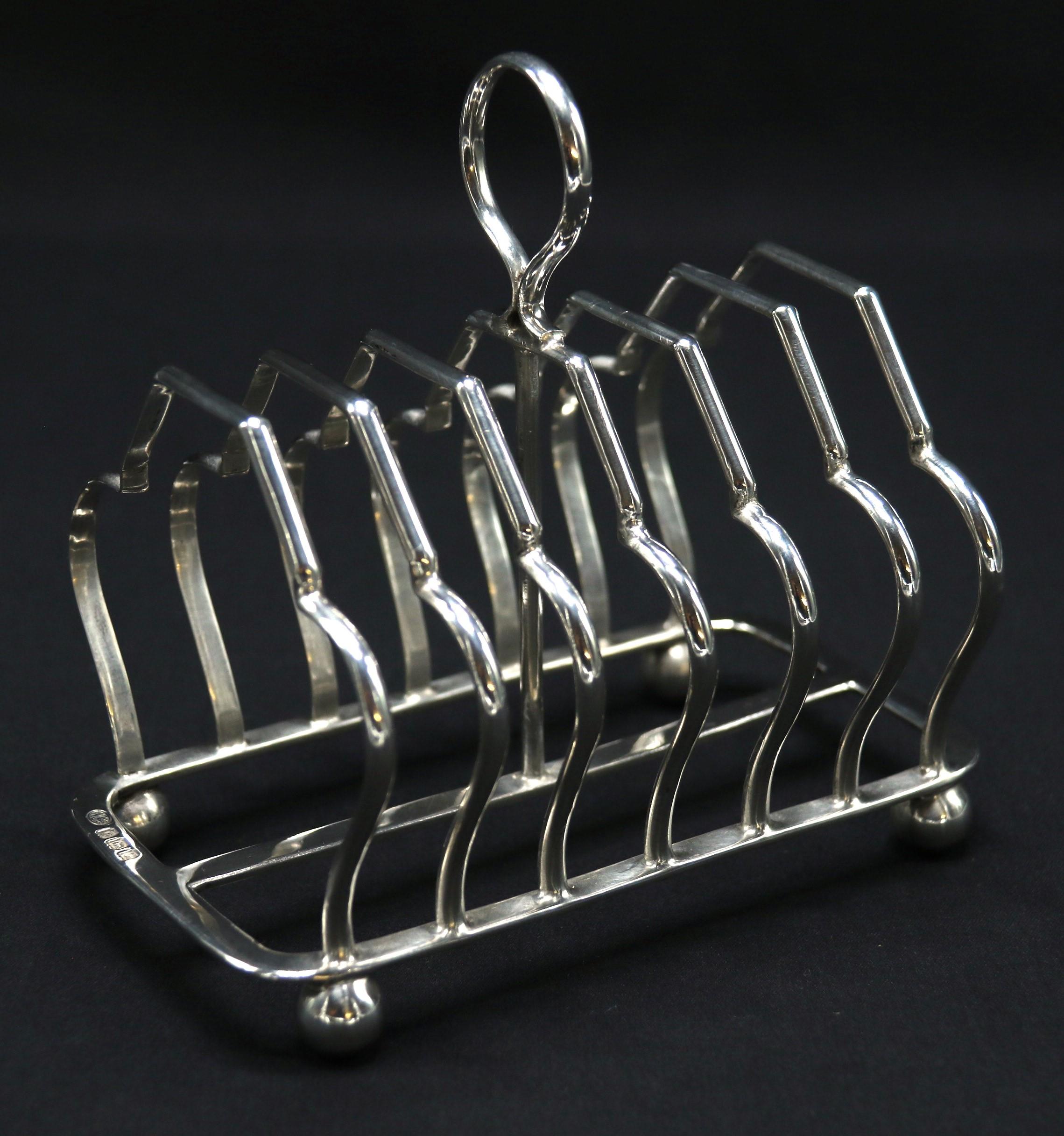 Art Deco An English heavy solid silver toast rack of larger proportions 1924 - 1925 For Sale