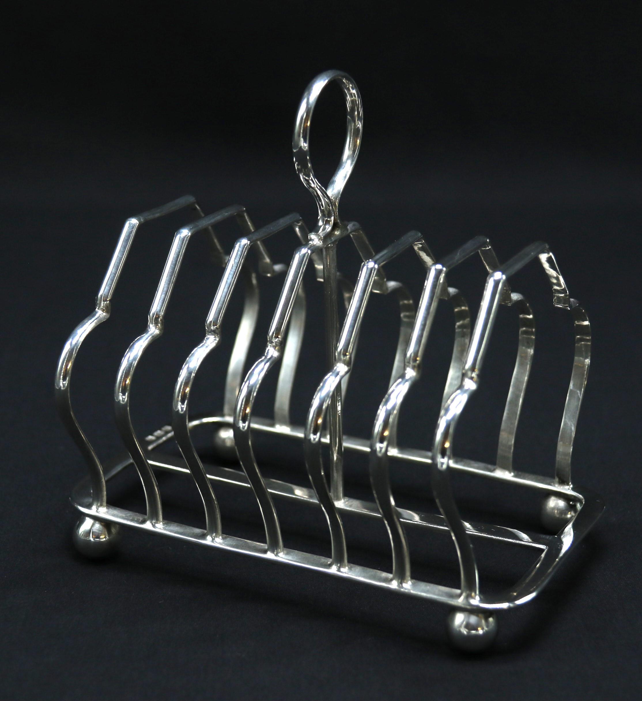 20th Century An English heavy solid silver toast rack of larger proportions 1924 - 1925 For Sale
