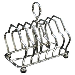 Antique An English heavy solid silver toast rack of larger proportions 1924 - 1925
